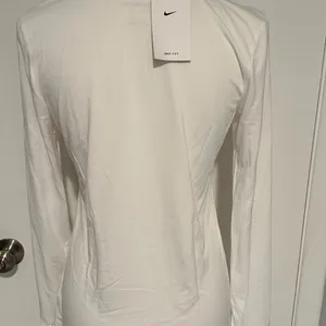 The Nike Tee Women's - Dry Fit - Long Sleeve - Size‎ M - NEW With Tags. thumbnail 4