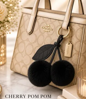NEW Cherry Pom Pom Bag Charm Keychain Black Faux Fur NWT thumbnail 1