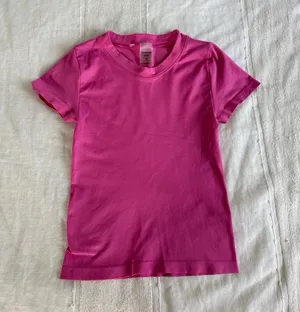 Aritzia “Seamless tee” in a vibrant pink color thumbnail 1
