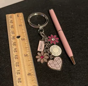 Coach charm & Coach pen thumbnail 4