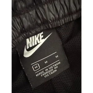 NIKE Sportswear Black Elastic Drawstring Waist Rebel cargo pants EUC thumbnail 4