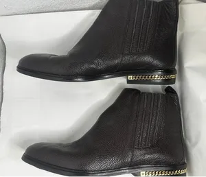 Michael Kors Chelsea boot with pebbled leather and stylish chain thumbnail 1