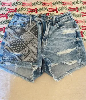 American Eagle blue denim shorts with bandana print pocket, Size 0. thumbnail 1