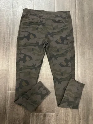 Soft black camo leggings with a smooth finish. Elastic waistband for a snug fit. Simple versatile style for everyday wear. Mudd. Size large. 65% rayon, 30% nylon, 5% spandex thumbnail 1