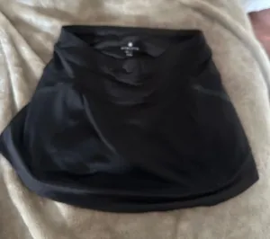 Athleta black tennis mini skirt with built in shorts. thumbnail 1