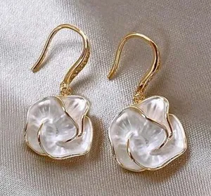 Gold and White Floral Earrings thumbnail 1