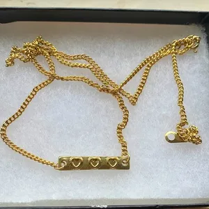 Gold Tone Three Heart Bar Necklace thumbnail 1