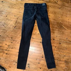 American Eagle size 2 distressed holey stretch jeggings thumbnail 3