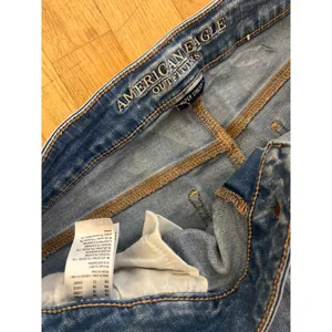 American eagle 18 short comfort stretch waistband medium wash hi rise jegging thumbnail 4