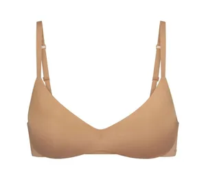 SKIMS WIRELESS FORM PUSH-UP PLUNGE BRA | OCHRE thumbnail 1