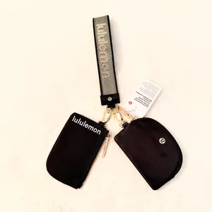 Lululemon Dual Pouch Wristlet Black Gold thumbnail 2