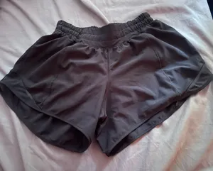 Lululemon Black Hotty Hot Long Shorts 4" thumbnail 1