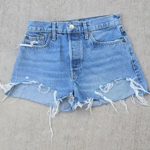 Re/Done Light Blue Distressed Denim Cutoff Shorts thumbnail 1