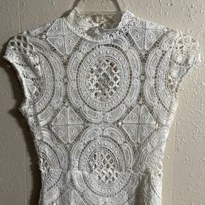 Hot Miami Styles Cream Mini Dress with Mock Neck and Flutter Sleeves thumbnail 2