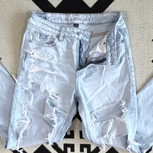 American Eagle Ripped Mom Jeans in Indigo Shatter Size 8 thumbnail 9