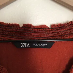 Zara Ruffle Midi V-Neck Terracotta Orange Red Smocked Tiered Flowy Dress Small thumbnail 4