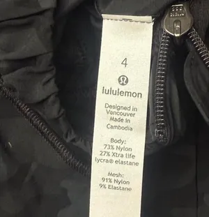 Lululemon black camo jacket Size 4 it also has an opening for a ponytail in the hood. Fantastic condition #athleisure #camouflage #lululemon thumbnail 3
