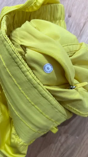 Lululemon hotty hot shorts neon yellow I believe they are 4’ thumbnail 4