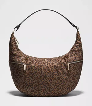 Lululemon Large Slouchy Sling Bag 13L Metal Hardware leopard print NWT thumbnail 1