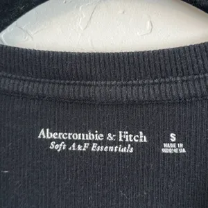 Abercrombie & Fitch | Soft A&F Ribbed Long Sleeve Thong Bodysuit in Black thumbnail 5