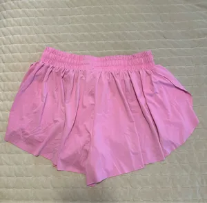 Pink butterfly shorts with built in spandex thumbnail 2