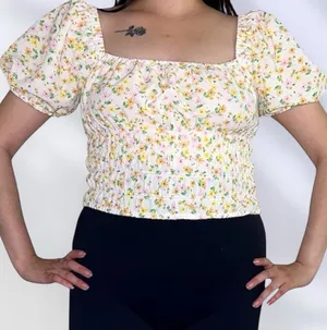 Elodie White floral smocked top. thumbnail 1