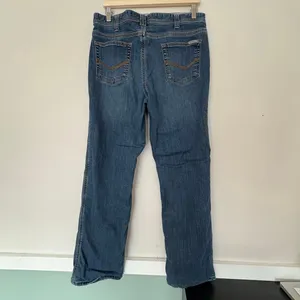 Women's Carhartt Jeans Relaxed Fit Blue Denim Size 12 flannel lined thumbnail 2