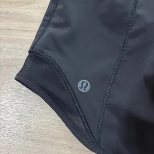 Lululemon Hotty Hot Short High-Rise Long 4" Women Size 4 Black thumbnail 4
