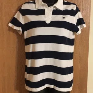 Izod women’s cute navy and white striped golf shirt. Size M. EUC‎ thumbnail 1
