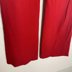 Athleta Salutation Stash Pocket Rib Flare Meg Red Pants Womens Medium thumbnail 11