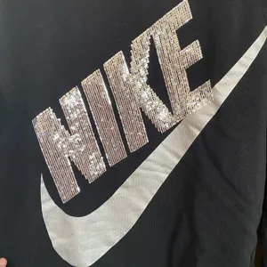 Nike Women’s Rally Sequin Black Pullover Sweatshirt thumbnail 4
