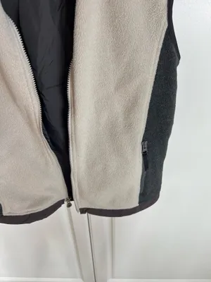 Warm sleeveless fleece vest with contrasting side panels. Full zip front for easy wear. Zippered pockets secure small items. Simple, versatile layer for cool days. Land’s end size medium (10-12) thumbnail 2