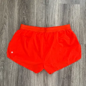 lululemon Bright Orange Shorts Size XL Mid Rise 3.5” thumbnail 2