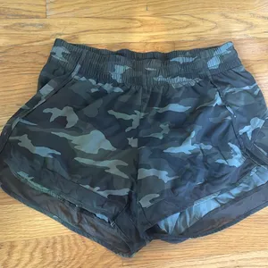 Athleta Mesh racer run short 4” thumbnail 1