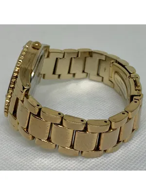 Women’s gold tone watch 38mm round quartz analog mop dial size 7” running thumbnail 4