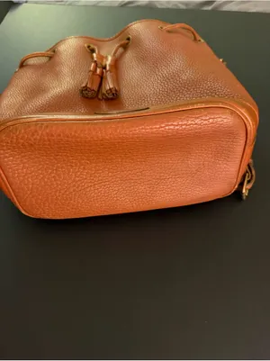 Dooney & Bourke Orange Pebble Leather Bucket Bag with Tassel Drawstring thumbnail 4