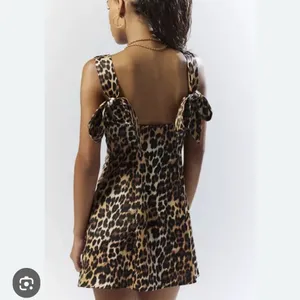 Urban Outfitters 🖤🤎 Bri Double Bow Satin Mini Dress in Leopard Print - Size XS thumbnail 2
