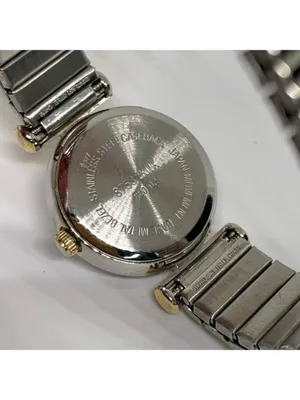 Women’s quartz analog watch silver gold tone 23mm stretch band running thumbnail 7