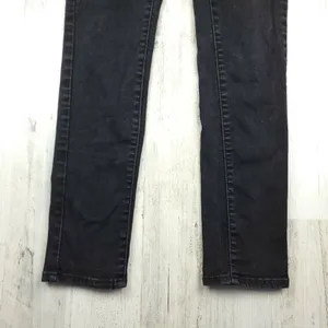 Levi’s Slimming Skinny Jeans Women’s Size 28 Black Stretch Denim Mid Rise thumbnail 3