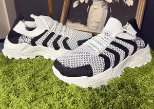 Knit Slip-On Athletic Sneakers in Black & White thumbnail 1