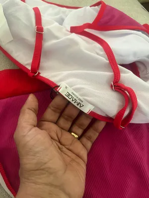 Make a splash with this vibrant pink bikini set. Perfect for a day at the beach or lounging by the pool. thumbnail 7