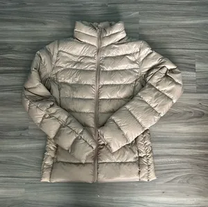 Uniqlo tan puffer jacket  thumbnail 1