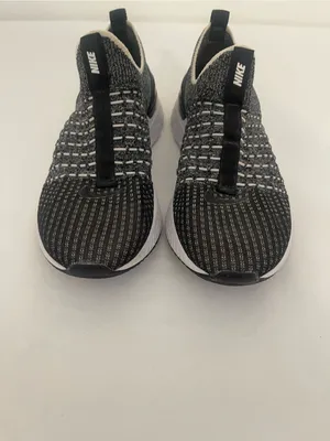 Nike Women’s Black and White Slip-On Knit Sneakers thumbnail 2