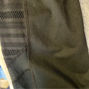 Champion Capri Leggings with mesh/mesh type detail on bottom in black sz medium thumbnail 5