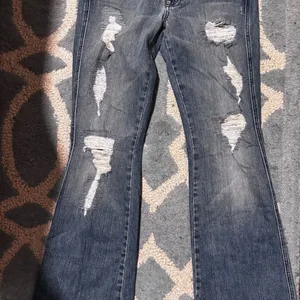 7 For All Mankind Distressed Flare Jeans in Dark Blue thumbnail 1