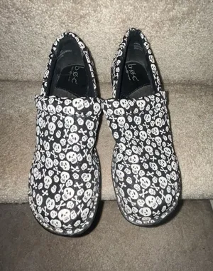 B.O.C. Born Concept Women's Black and White Skull Print Slip-On Clogs thumbnail 1