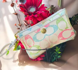a vintage Coach Y2K pastel scribble wristlet ivory Canvas bag thumbnail 1