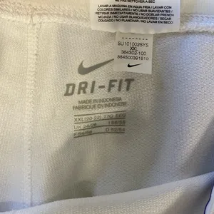 NIKE Foldover Waistband Cropped Capri Pants thumbnail 7