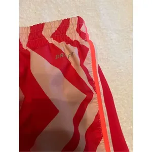 Nike Dri Fit Women’s Athletic Shorts orange/ white/zebra print size M thumbnail 8