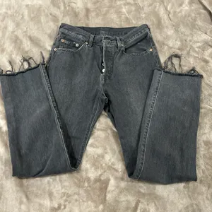 Levi’s 501 black raw hem jeans button fly 27/30 thumbnail 1